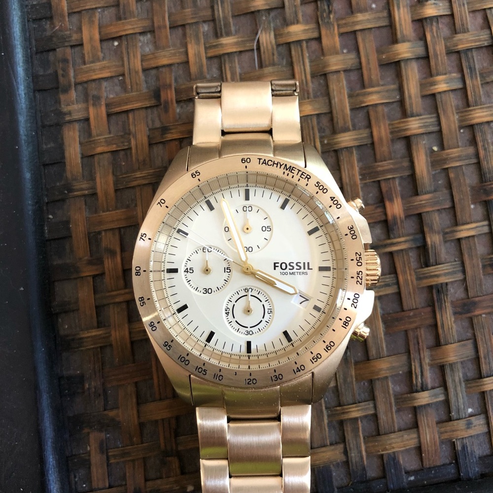 Fossil Mens Gold tone stainless steel watch.